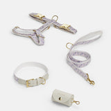 Trove Dog Harness, Leash and collar in lilac and pink, with a cream leather-like poop bag holder