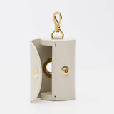 Mela Caspita Poop Bag Holder - Cream - By Scout