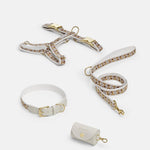 Trove Dog Harness, Leash, and collar in golden brown, with a cream poop bag holder