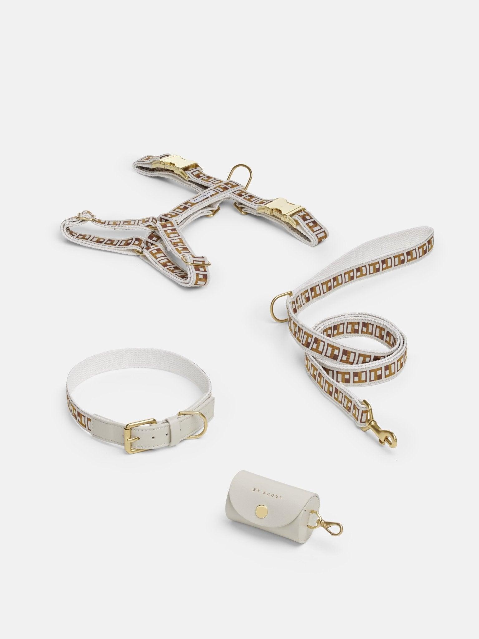 Trove Dog Harness, Leash, and collar in golden brown, with a cream poop bag holder