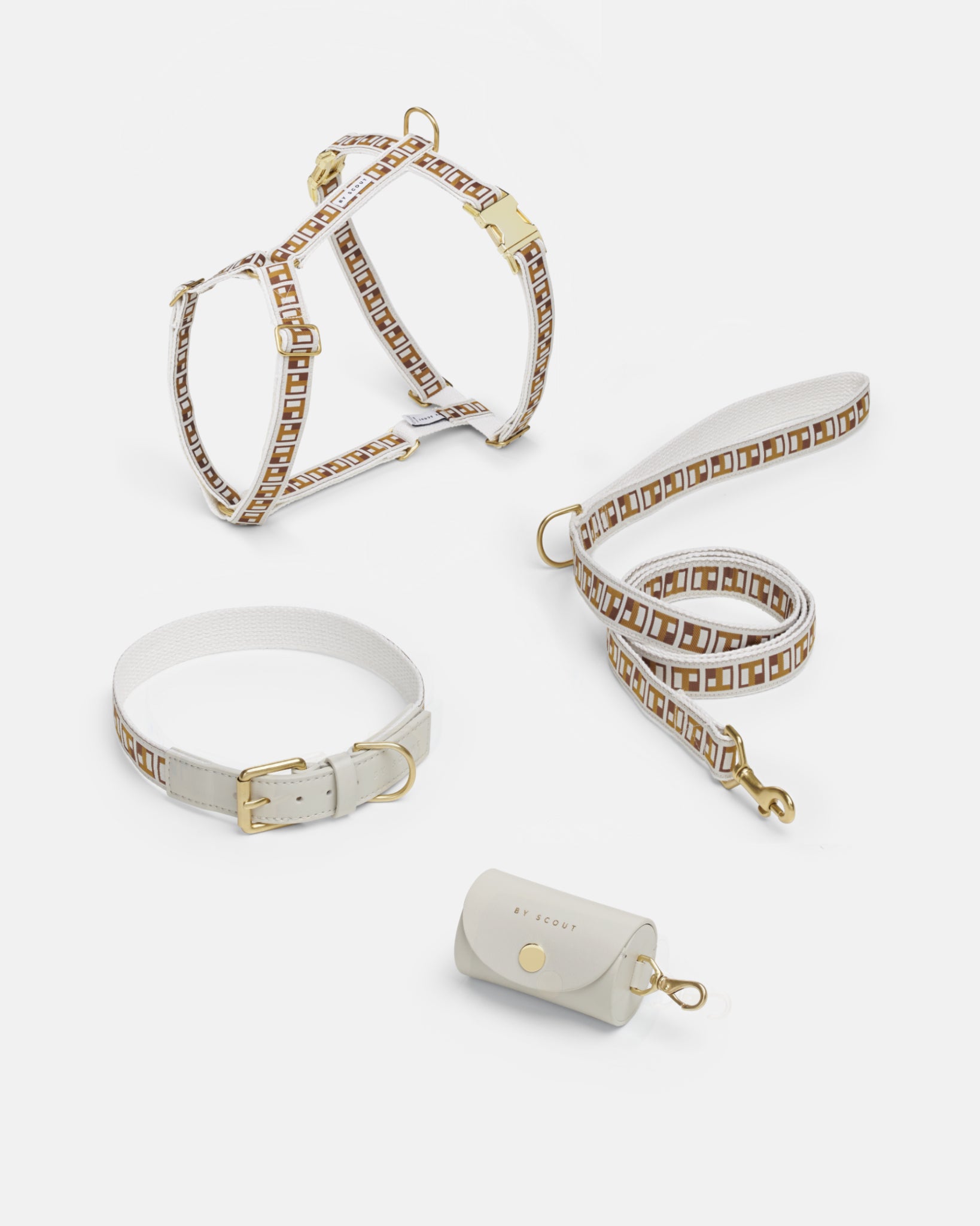Trove Dog Harness, Leash, Collar in golden brown, with a cream leather-like poop bag holder